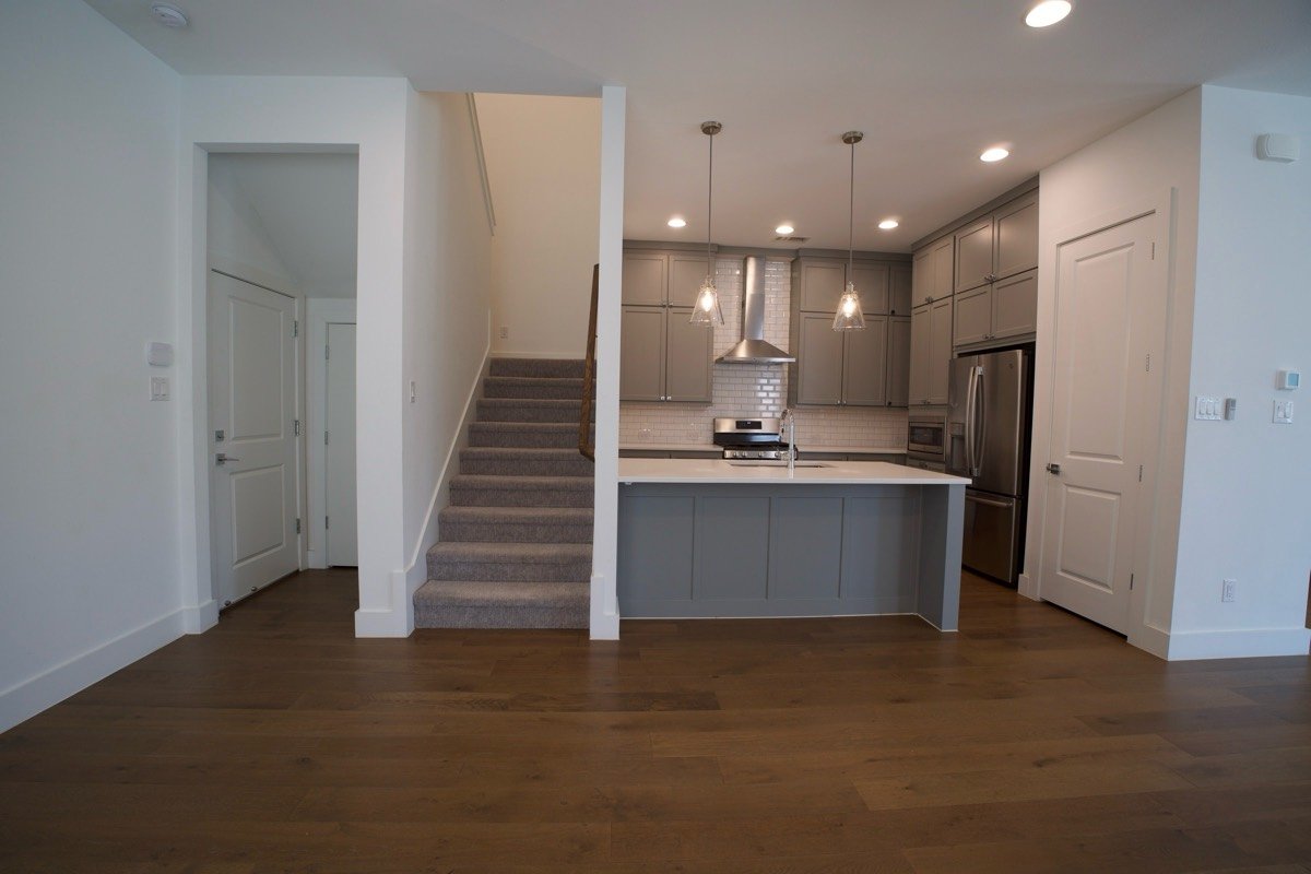 The same kitchen straight out of the camera, darker and flatter