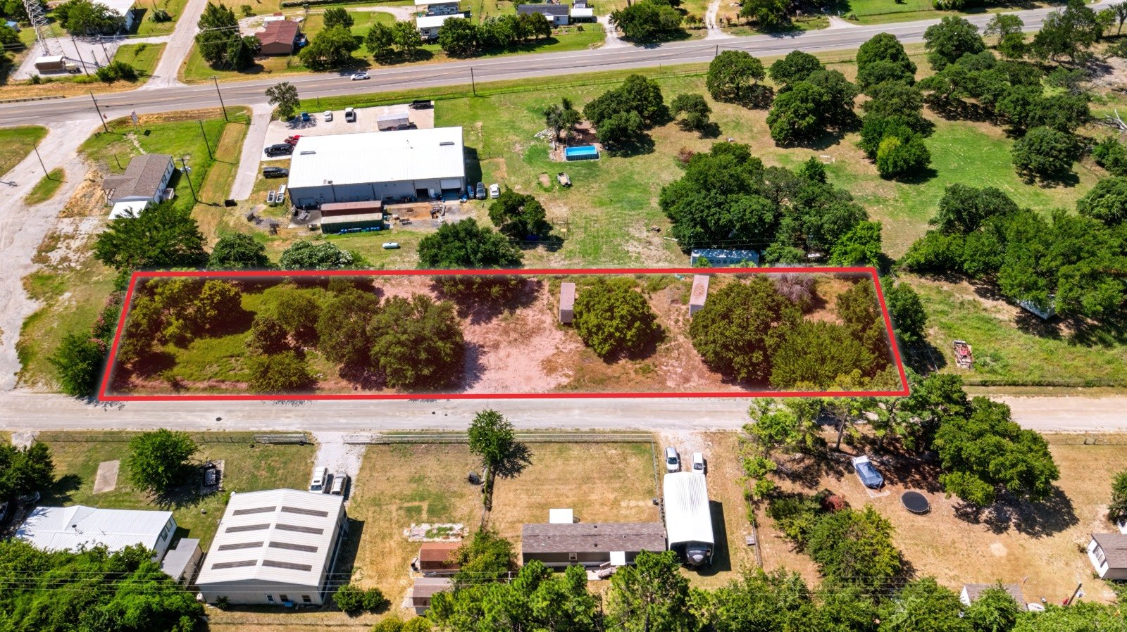 Aerial of a lot in Azle with the lot lines drawn in