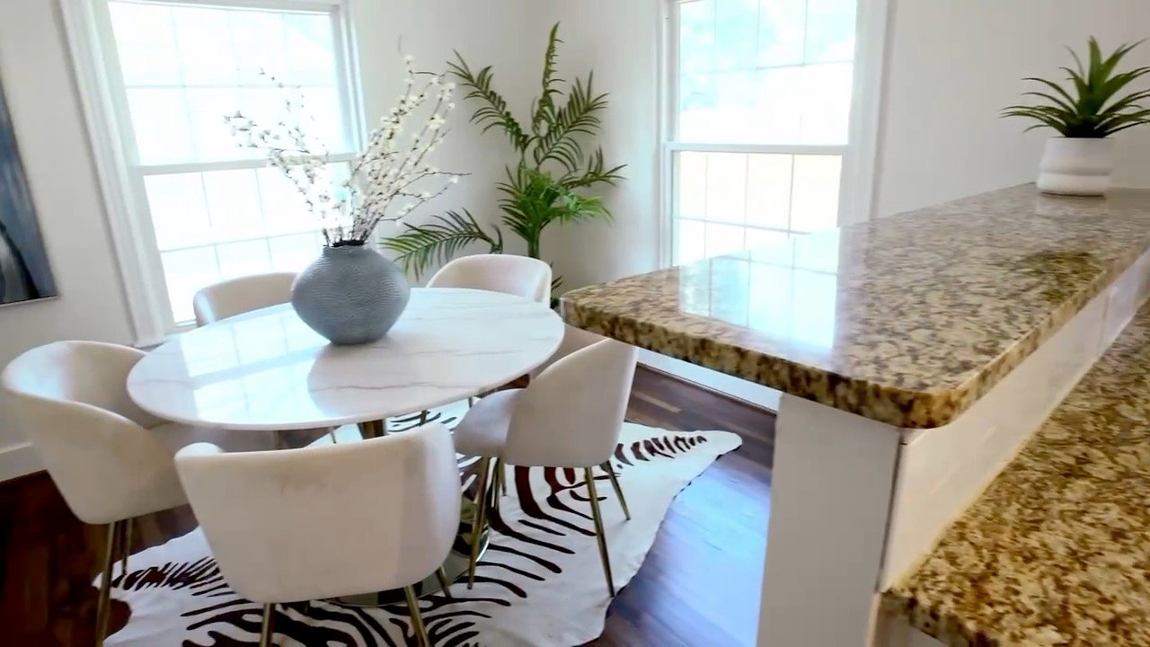 Dining area at 3609 Stadium Dr in window light